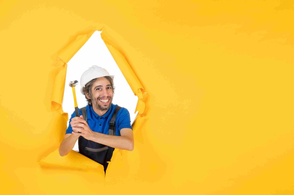 front-view-male-builder-uniform-with-hammer-yellow-wall-worker-man-building-job-constructor-architecture-color_11zon